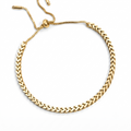 Goldfarbenes Damen-Armband aus Edelstahl im markanten Fischgräten-Design mit einem praktischen, flexiblen Zugverschluss, Hauptfoto.