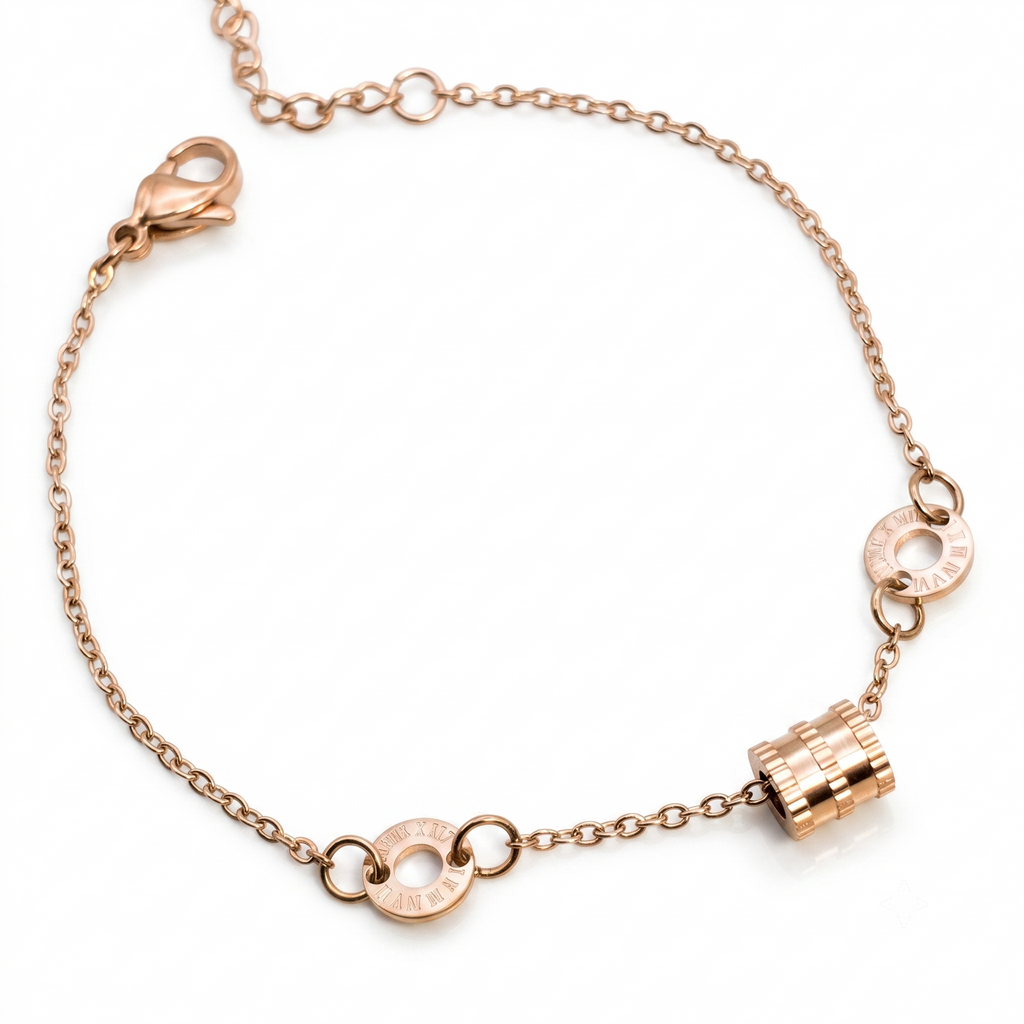 Rosegoldfarbenes Damen-Armband aus Edelstahl mit kleinen Logoringen und einem strukturierten, kleinen Zylinder-Element, Hauptfoto