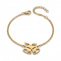 Goldfarbenes Edelstahl-Armband für Damen mit einem festlichen Motiv aus zwei Weihnachtsglocken, Hauptfoto