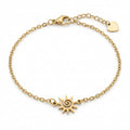 Goldfarbenes Edelstahl-Armband für Damen mit einem verspielten Sonnen-Element samt integrierter Spirale, Hauptfoto