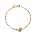 Elegantes goldfarbenes Damen-Armband aus Edelstahl mit einem zarten Blumen-Anhänger, Hauptfoto