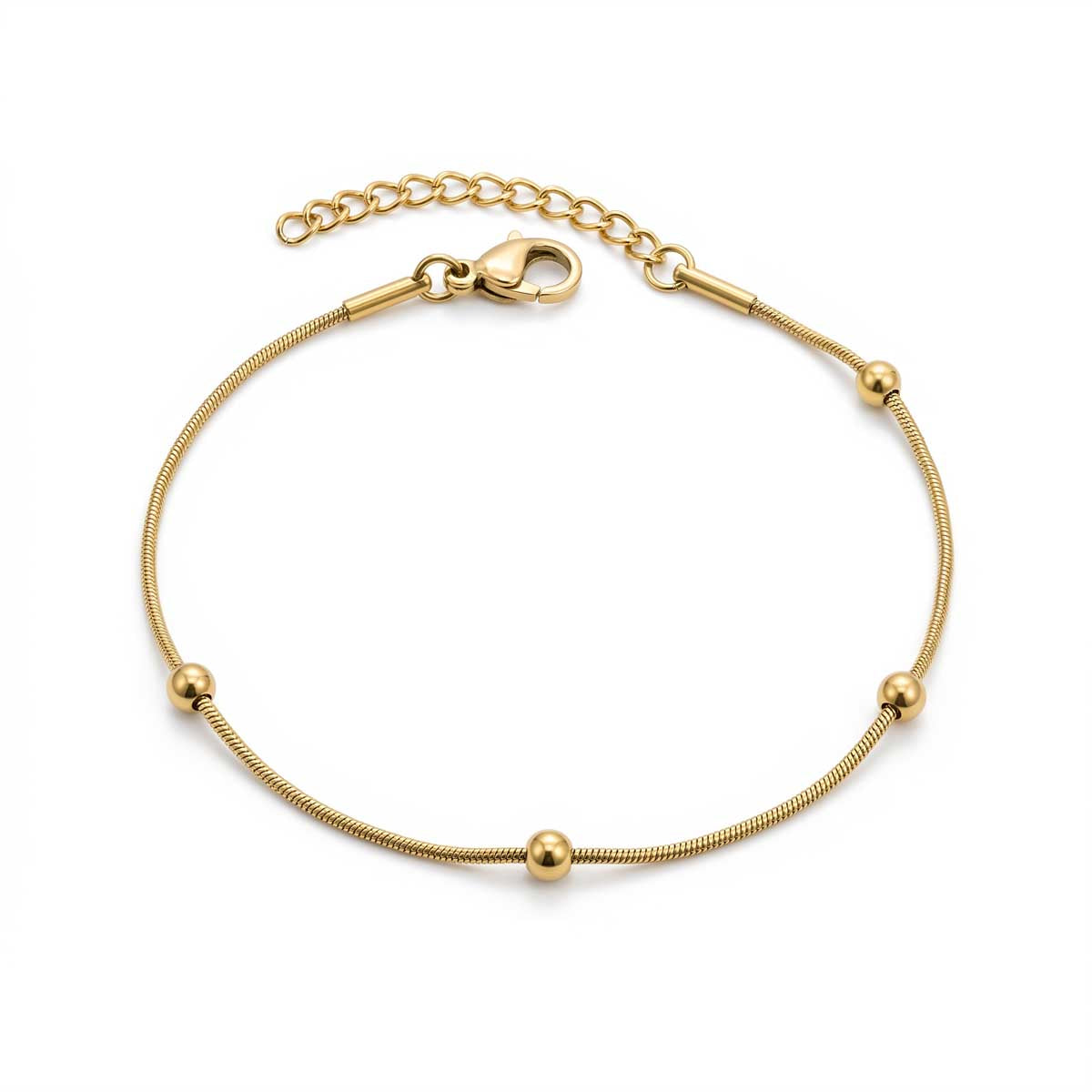 Alt-Text: Goldfarbenes Damen-Armband aus Edelstahl aus einer feinen Schlangenkette mit kleinen integrierten Kugeln, Hauptfoto.