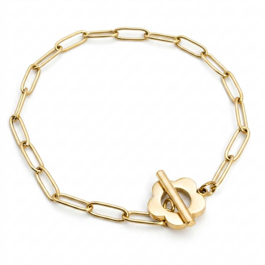 Goldfarbenes Damen-Armband aus Edelstahl mit länglichen Kettengliedern und einem dekorativen Knebelverschluss in Blumen-Form, Hauptfoto