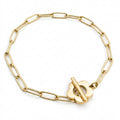 Goldfarbenes Damen-Armband aus Edelstahl mit länglichen Kettengliedern und einem dekorativen Knebelverschluss in Blumen-Form, Hauptfoto