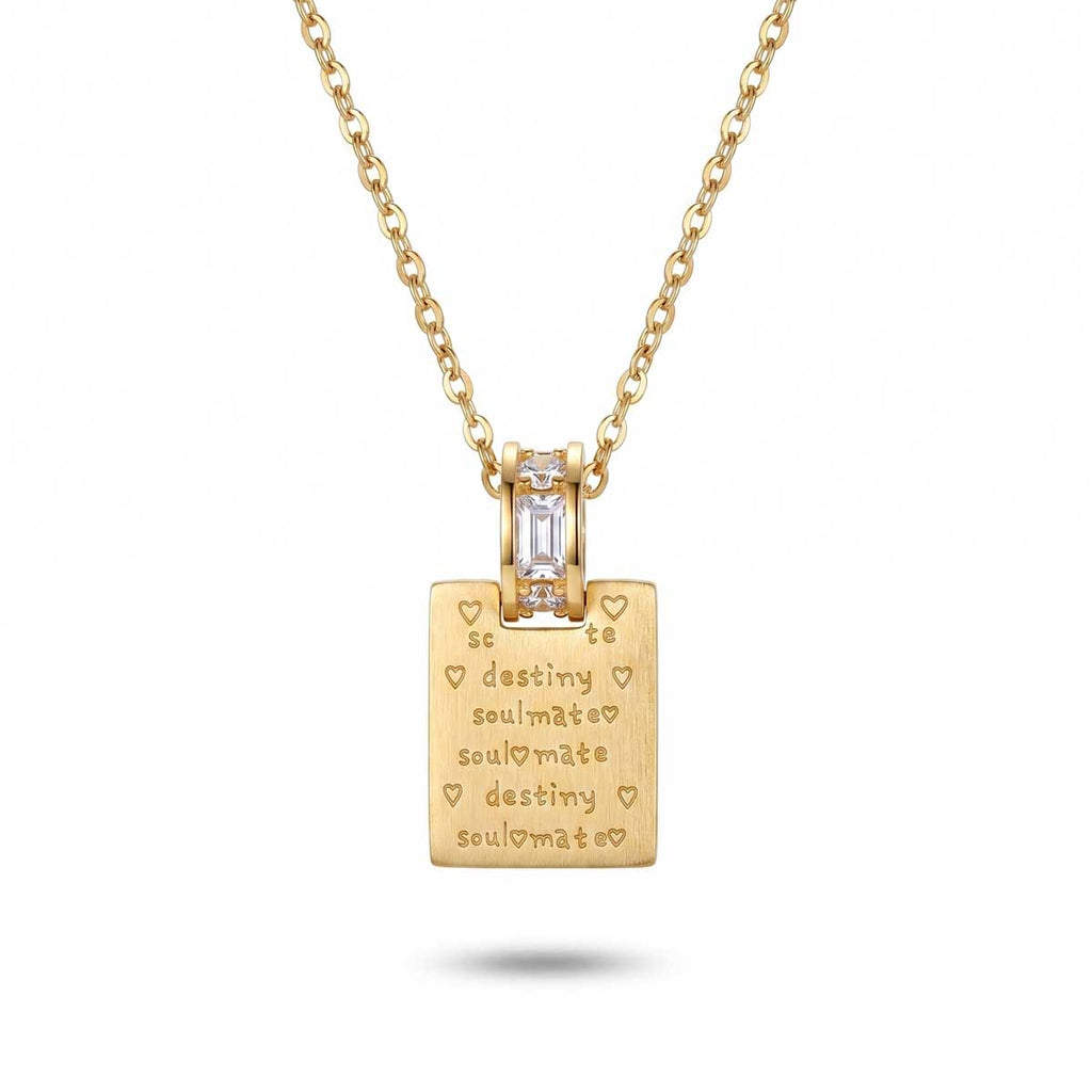 Goldfarbene Damen-Halskette aus Edelstahl mit einer gravierten rechteckigen Plakette und zirkoniabesetzter Öse, Hauptfoto.