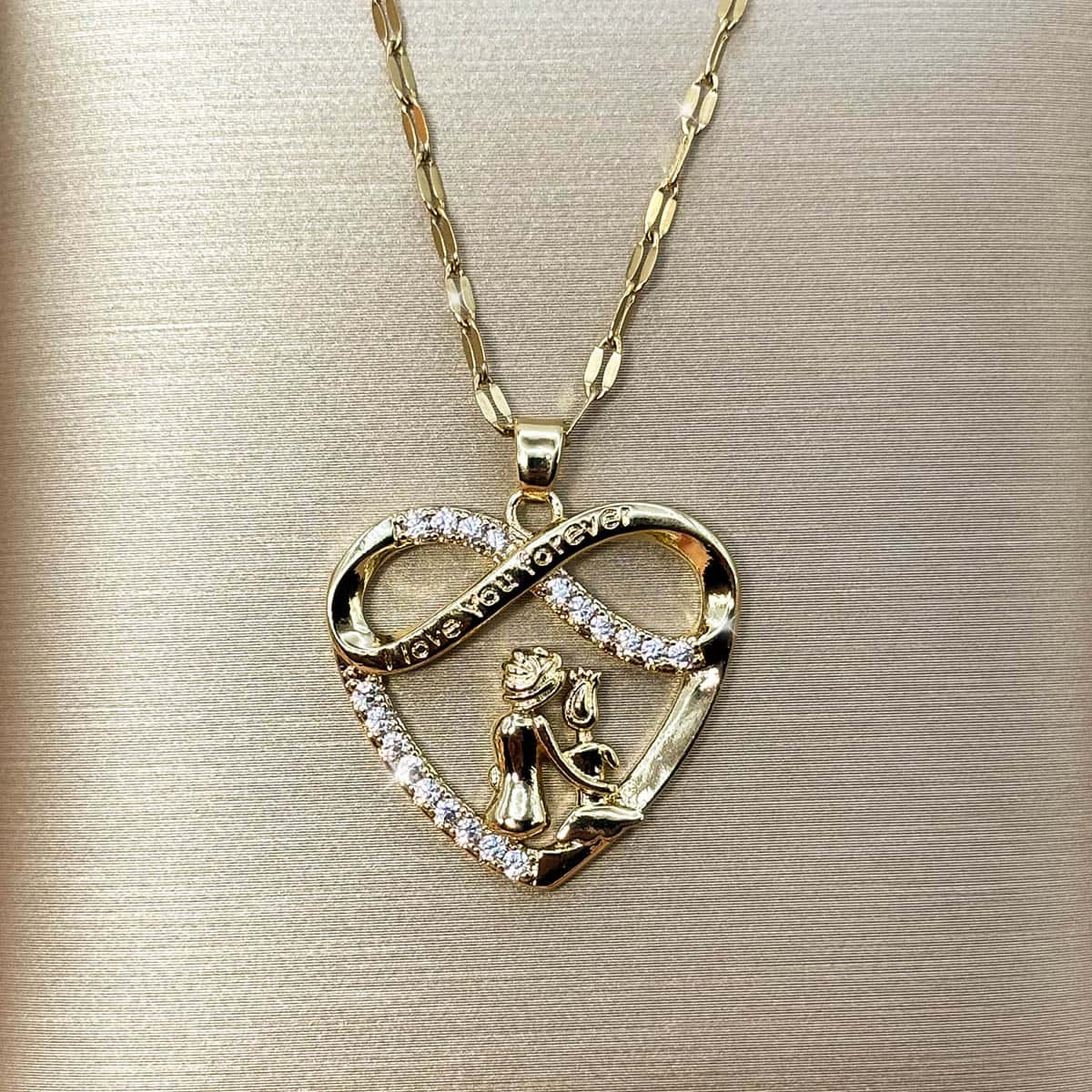 Goldene Halskette mit Herz-Anhänger, Unendlichkeitsschleife und Zirkonia-Besatz, Hauptfoto der Vorderseite.
