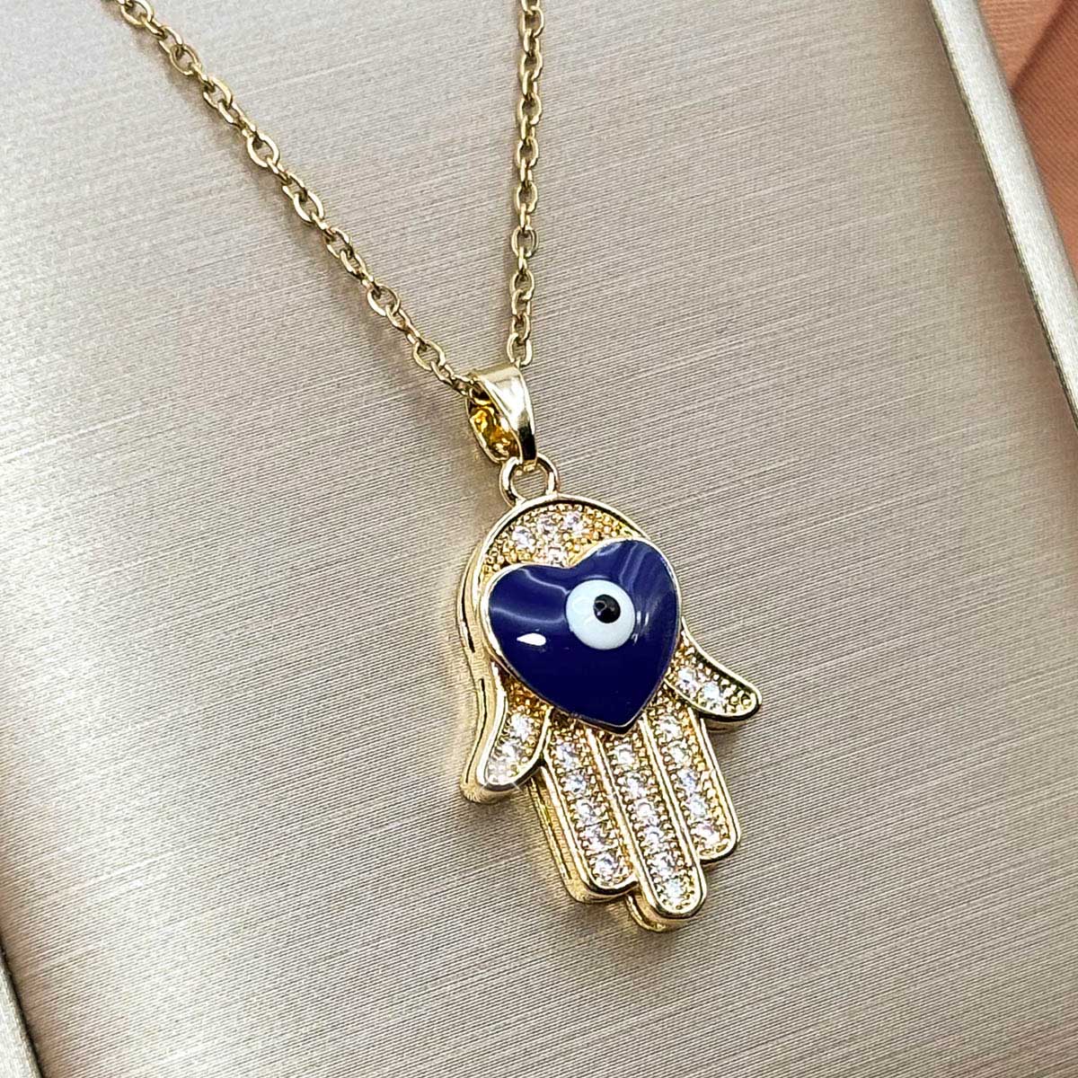 Goldfarbene Edelstahl-Halskette für Damen mit einer hängenden Hand der Fatima, besetzt mit blauem Herz und Zirkonia, Produktfoto